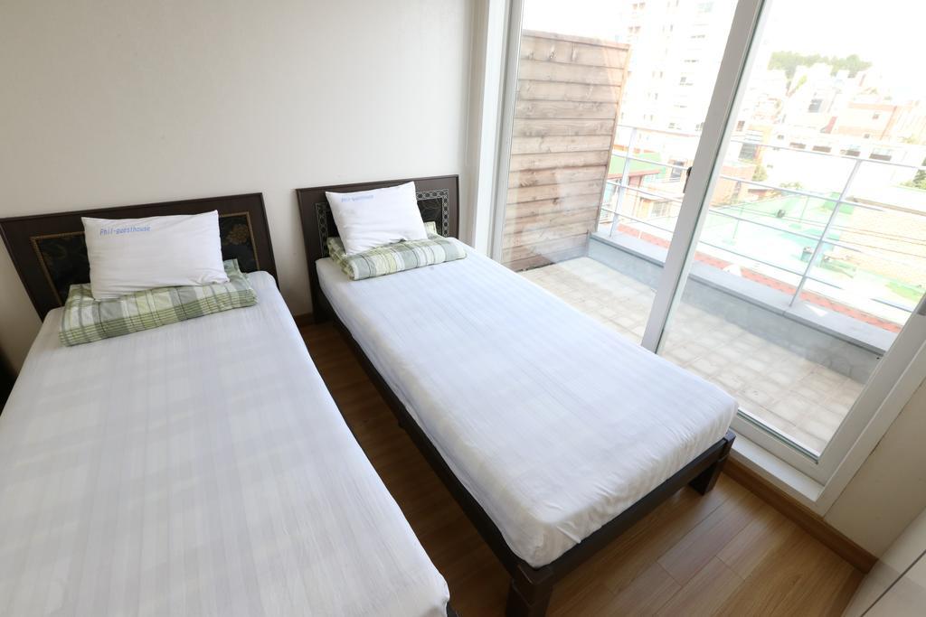 Hostel Phil House Guri Pokoj fotografie
